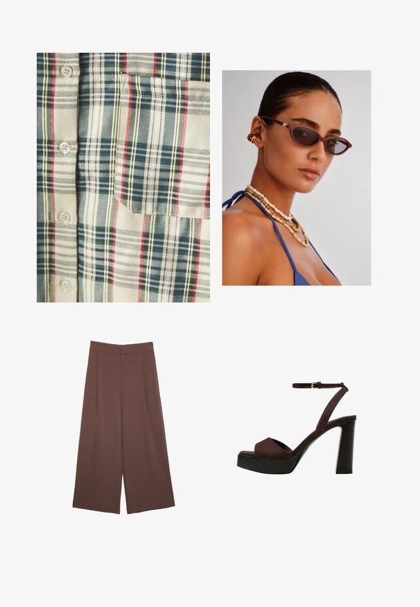 Camicia a scacchi color crema con accenti verde scuro, rosso e giallo. Presenta una tasca e bottoni rotondi, realizzata in un morbido tessuto intrecciato.; Pantaloni ampi marroni con una texture liscia, caratterizzati da una vita alta e pieghe frontali. Il tessuto è leggero e scorre liberamente.; Sandal in camoscio marrone con tacco alto, punta aperta, cinturino alla caviglia regolabile e suola a piattaforma striata.; Occhiali da sole cat-eye color marrone con lenti scure, intricate collane di perline marroni e un top di tessuto blu. Pelle liscia con una finitura naturale.