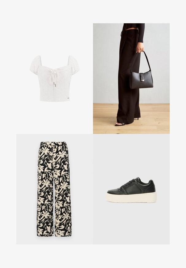 Witte katoenen crop top met pofmouwen, opengewerkte details en een strik aan de voorkant. Heeft een getailleerde bodice en een decoratieve logo-accent.; Zwarte wijde broek met een crèmekleurig bloemenpatroon. Gemaakt van lichtgewicht stof, met een zachte textuur en een hoge tailleband.; Zwarte leren sneaker met een gladde textuur, dikke crème-kleurige zool, ronde neus en een klassieke vetersluiting. Subtiele stikseldetails.; Zwarte handtas met gestructureerde vorm, gladde textuur en een metalen sluiting. Gecombineerd met brede zwarte broeken en sandalen met open teen op een houten vloer.