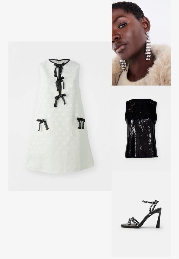 Black sleeveless top adorned with sequins, featuring a shiny texture and a fitted design. Round neckline with no visible fastenings.; Sleeveless white dress with subtle heart pattern, black zipper, and three black sequin ties on the front and two pockets with ties.; Black high-heeled sandal with a wide strap, studded accents, and a sleek design; features a buckle closure and a smooth finish.; Silver drop earrings with multiple clear rhinestones, featuring a cascading design and textured surfaces, set against a neutral background.