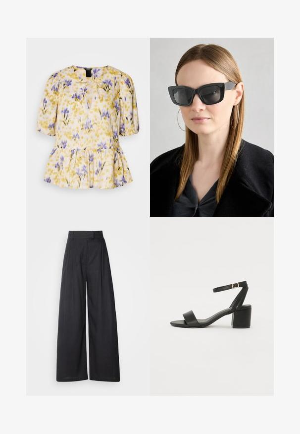 Blusa floral com um padrão amarelo, roxo e rosa. Apresenta mangas bufantes, detalhe de laço na gola e uma bainha peplum. Tecido leve.; Calças largas e escuras com um cós estruturado e pregas. Feitas de um tecido leve, com uma textura suave e sem padrões visíveis.; Sandal de salto alto preto com um cabedal em couro liso, biqueira aberta, tiras frontais largas e tirante no tornozelo ajustável com detalhe em fivela dourada.; Óculos de sol pretos em formato de gato com lentes escuras, armações grossas e acentos subtis. Usados com um casaco preto e uma blusa cinza, apresentando cabelo longo e liso.