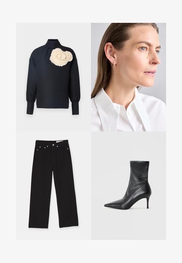 Maglietta nera a maniche lunghe con superficie texture, caratterizzata da una rosa testurizzata di colore crema sulla spalla sinistra. Collo alto, maniche aderenti.; Jeans neri a gamba larga realizzati in denim, con design a cinque tasche, chiusura con bottone e dettagli in metallo. Tessuto testurizzato con una finitura liscia.; Stivale alla caviglia in pelle nera con punta affilata, tacco a stiletto sottile e tomaia aderente simile a una calza. Texture liscia con dettagli di cucitura minimi.; Orecchino a cerchio in oro con una piccola gemma decorativa. Indossato da un modello con capelli lisci, abbinato a una camicia bianca con colletto.