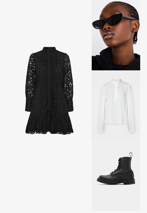 Fehér, hosszú ujjú blúz magas nyakkal, fodros gallérral, elülső gombos záródással és finom pöttyös mintázattal a texturált anyagon.; Fekete hímzett ruha magas gallérral, gombos elülsőrészsel, hosszú ujjakkal és fodros szegéllyel. Kivágott virágos és geometrikus mintákkal díszített.; Fekete bőr harci csizma, kerek orral, fűzős elülső résszel és húzófüllel a bokánál. Vastag gumitalp jellemzi, amely tartósságot biztosít.; Fekete macska szemüveg napszemüveg, matt felülettel, amely karcsú formájával és finoman ívelt széleivel tűnik ki, egy modell sötét ruhái háttérben.