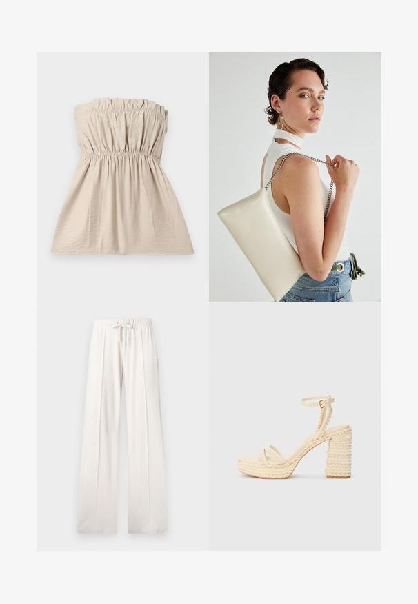 Ujjatlan bézs felső, gyűrt textúrával, elasztikus szalaggal a tetején és a deréknál, valamint légies sziluettel. Könnyű, finoman fénylő anyag.; Világos bézs színű, puha anyagból készült melegítőnadrág, állítható derékkal, széles lábakkal és függőleges varratokkal, sima felülettel.; Bézs színű, pántos sarkú szandál, fonott juta talppal és sarkal, vékony boka pánttal és sima talpbetéttel.; Fehér, téglalap alakú, fényes anyagból készült clutch táska, ezüst láncos pánttal. A modell pózol, bemutatva a táskát egy egyszínű háttér előtt.