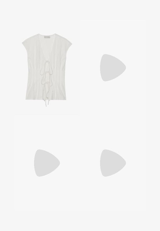 White short-sleeved top with a deep V-neck and front tie detail. The fabric has a smooth texture with vertical pleating accents.; Maxi skirt featuring a lightweight fabric with a bright multi-pattern, including fruits and coastal scenes in pastel colors and textured accents.; Black slide sandals with two buckled straps, cork-like midsole, flat rubber outsole, and a smooth matte finish.; Black sunglasses featuring a sleek rectangular frame with a gold logo accent on the side. Dark lenses and glossy finish are prominent.