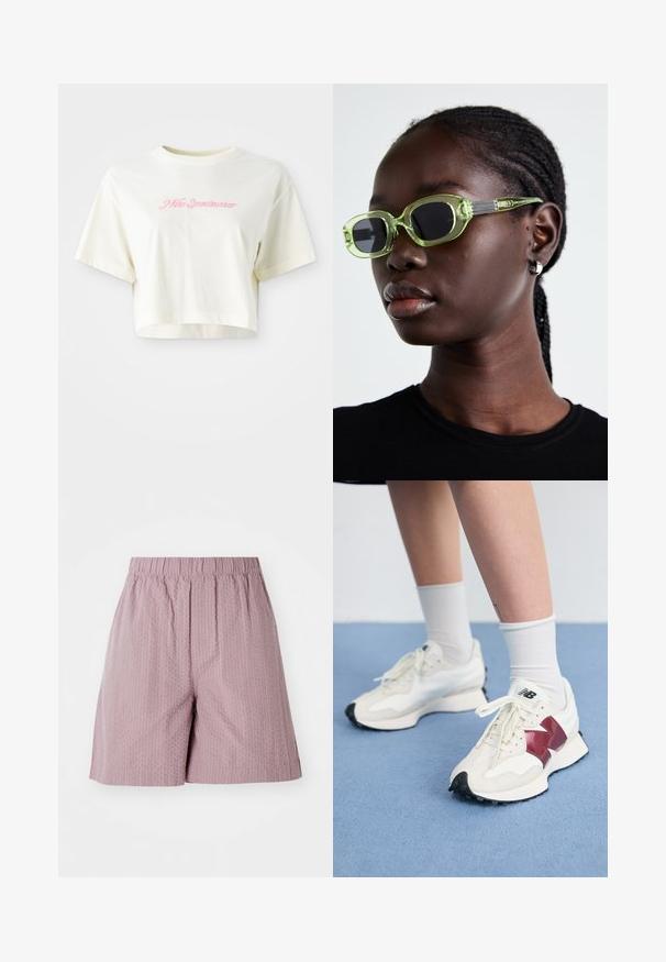 T-shirt cropped de couleur crème en coton. Présente un logo brodé rose avec l'inscription "Nike Sportwear". Manches courtes et encolure ronde.; Shorts rose clair en tissu texturé avec taille élastique et coupe droite. Présente un motif subtil et un ourlet soigné.; Une paire de baskets blanches avec des accents bordeaux, des panneaux texturés, une semelle noire plate et des lacets légers, portées avec des chaussettes blanches mi-mollet.; Lunettes de soleil teintées en vert avec une monture rectangulaire fine et des verres foncés ; branches grises texturées avec un logo. Peau lisse et chemise noire.