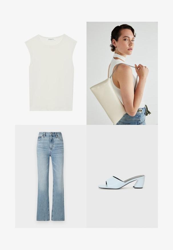 Balta be rankovių palaidinė su apvaliu kaklu. Pagaminta iš lygios medžiagos, ji turi laisvą siluetą ir minimalistinį dizainą. Be raštų ar akcentų.; Šviesiai mėlyni aukšto liemens džinsai, pagaminti iš džinsinio audinio, su tiesiomis kojomis, penkių kišenių dizainu ir švelniu šviesinimu šlaunų srityje.; Šviesiai mėlynos atvirų pirštų kulno mules su geometriniu dizainu, turinčios plačią juostą per pėdą ir stambų, kampuotą kulną.; Balta, stačiakampio formos rankinė pagaminta iš blizgaus medžiagos, su sidabriniu virvute. Modelis pozavo, demonstruodamas rankinę prieš paprastą foną.