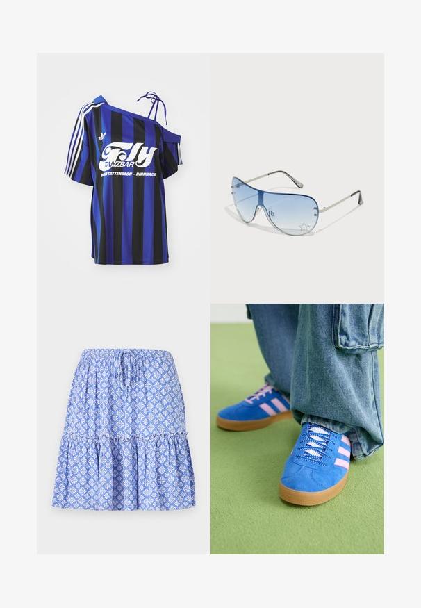 Niebieska i czarna, w paski oversize'owa koszula z jednym odkrytym ramieniem, z białym nadrukowanym tekstem i trzema białymi paskami na rękawie.; Niebieska spódnica w wzory z elastycznym pasem, warstwowym krojem i białymi motywami kwiatowymi. Wykonana z lekkiego materiału o miękkiej fakturze.; Niebieskie zamszowe buty z różowymi paskami i białymi sznurowadłami, z gumową podeszwą, zestawione z luźnymi dżinsami na zielonej powierzchni.; Okulary przeciwsłoneczne typu aviator z gradientowymi niebieskimi szkłami, srebrną metalową oprawą oraz dekoracyjnymi akcentami w kształcie gwiazdek na soczewkach. Gładki i elegancki design.