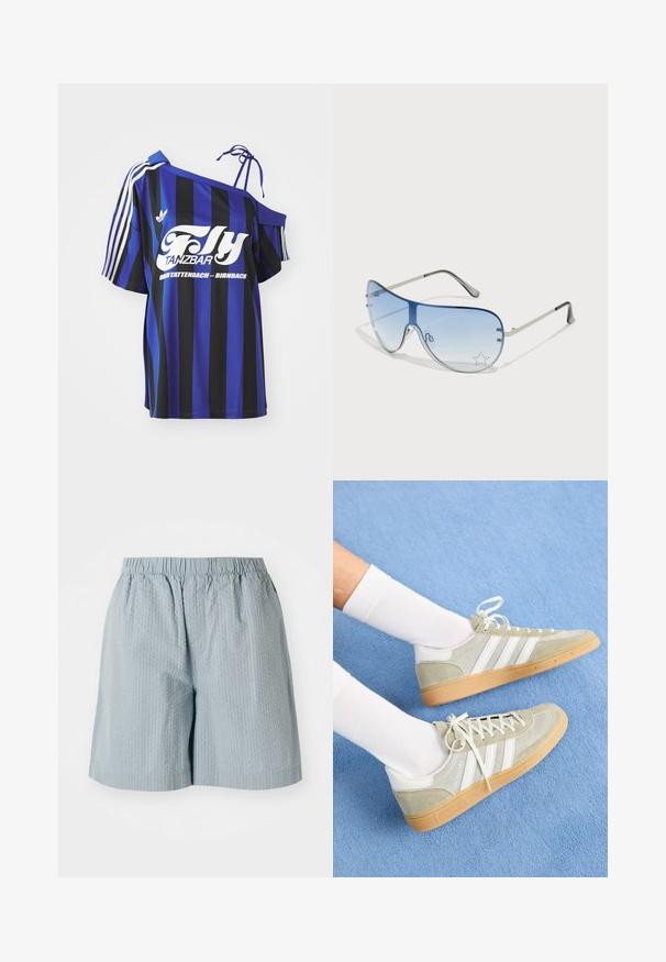Kék és fekete csíkos, oversized ing, egy vállról lelógó dizájnnal, fehér nyomtatott szöveggel és három fehér csíkkal az ujján.; Világoskék, texturált nadrág, rugalmas derékkal, laza fazonnal, látható zsebek vagy fémalkatrészek nélkül.; Világosszürke velúr sportcipők fehér gumitartozékokkal, három fehér csíkkal és rágózott outsole-lal, fehér zoknikkal viselve, kék háttér előtt.; Pilóta napszemüveg, melynek áttetsző kék lencséje, ezüst fém kerete és díszes csillag díszítések találhatók a lencsén. Simogató és elegáns dizájn.