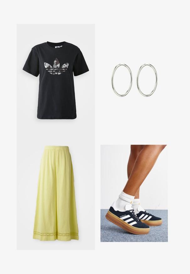 T-shirt en coton noir à manches courtes, avec un grand design argenté et marron du logo Adidas et des trois bandes à l'avant.; Pantalons larges jaunes en tissu texturé avec une taille élastique. Présente un détail en crochet à l'ourlet.; Baskets en daim noir avec des rayures et des accents blancs, bout arrondi, semelle extérieure en caoutchouc gomme, associées à des chaussettes blanches côtelées mi-mollet.; Boucles d'oreilles en argent, avec une finition lisse et polie. Forme ronde, design léger, avec un mécanisme de fermeture sécurisé.