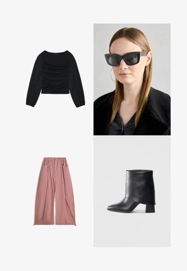 Fekete, hosszú ujjú felső, amely elől és a csuklónál ráncolt anyagrészletekkel rendelkezik, puha, rugalmas anyagból készült és csónaknyakú.; Laza szabású, magas derekú nadrág puha rózsaszín anyagból. Jellemzője a rugalmas derékpánt, két oldalsó zseb és sima, texturált felület.; Fekete bőr bokacsizma, hegyes orral, sima felülettel és strukturált blokk sarokkal. Magas, hajtott szegéllyel rendelkezik.; Fekete macskaszem napszemüveg sötét lencsékkel, vastag kerettel és diszkrét díszítésekkel. Fekete kabátot és szürke felsőt visel, hosszú egyenes hajjal.