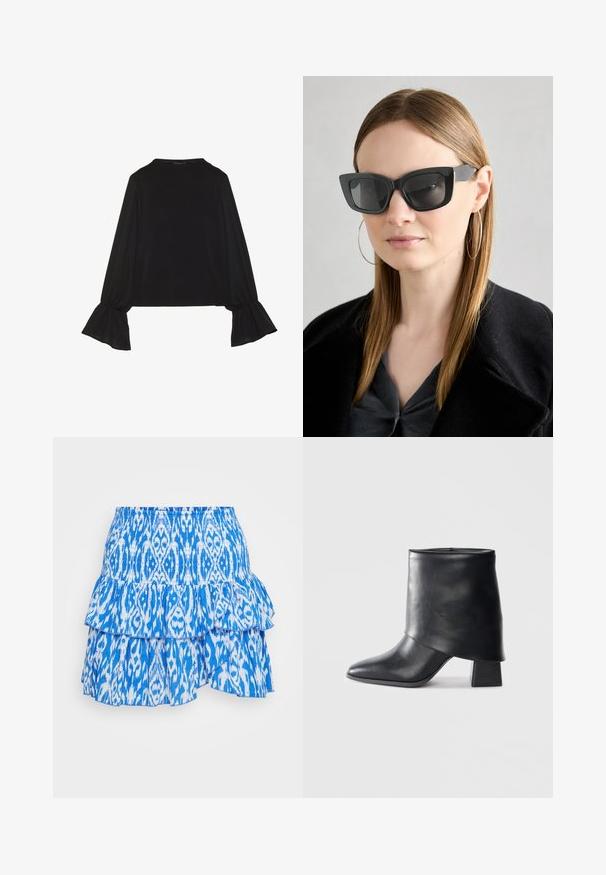 Svart långärmad topp med utställda ärmslut, mjuk textur och avslappnad passform, med en enkel rund halsringning.; Blå och vit lager-på-lager volangkjol med en smockad midja, med ett abstrakt mönster i ett lätt tyg.; Svart läder ankelboot med spetsig tå, slät textur och en strukturerad blockklack. Har en hög, vikbar krage.; Svarta katterformade solglasögon med mörka linser, tjocka bågar och subtila detaljer. Bärs tillsammans med en svart kappa och en grå topp, med långt rakt hår.