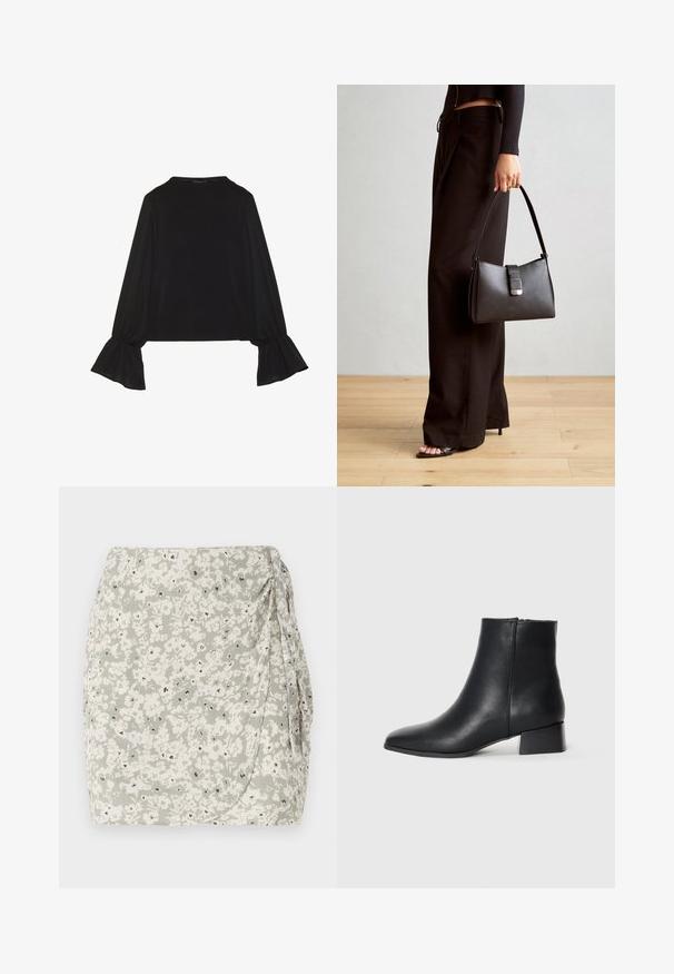 Zwarte langemouwen top met uitlopende manchetten, een zachte textuur en een relaxed fit, met een eenvoudige ronde halslijn.; Bloemenminirok in lichtgroen en crèmekleur met een geplooide zijkant en zwarte accentdetails. Zachte, gestructureerde stof met een wikkelontwerp.; Zwarte leren enkellaars met een spitse neus en een lage blokhak, met een gladde textuur en minimalistisch ontwerp.; Zwarte handtas met gestructureerde vorm, gladde textuur en een metalen sluiting. Gecombineerd met brede zwarte broeken en sandalen met open teen op een houten vloer.
