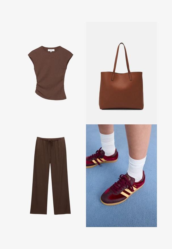 Brun ribbad kortärmad topp med en lätt rundad nederkant. Mjuk textur och avslappnad passform, med rund halsringning och minimala sömmar.; Bruna vida byxor i mjukt tyg, med resårmidja och dragsko samt två sidofickor.; Mörkröda mocka- och lädersneakers med gula ränder och gummisula. Vita ribbade strumpor synliga ovanför vristen, placerade på en blå texturerad yta.; Brun läder tote-väska med en slät textur, öppen toppdesign och två axelremmar. Har minimal söm och ingen synlig metalldetalj.