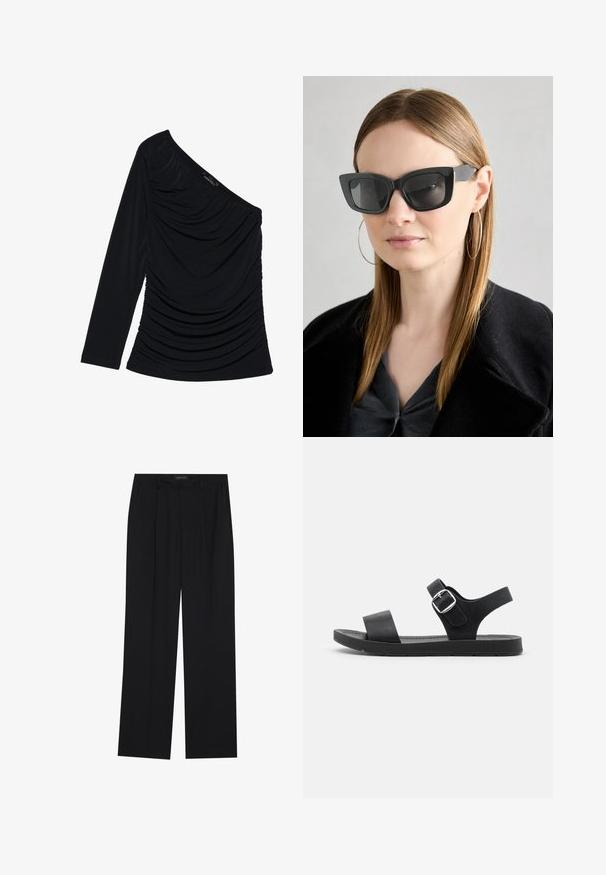 Melna garām piedurknēm blūze ar vienu plecu, ar teksturētu ručingu priekšpusē un gludu auduma apdari.; Melni bikses ar taisnu kāju dizainu, kurām ir divi priekšējie kabatas un jostasvieta. Izgatavotas no gludas, vieglas auduma.; Melnas sandales ar plakanu zoli, regulējamu sprādzi, divām platām siksnām un gludu tekstūru, paredzētas ērtai nēsāšanai.; Melna kaķa acs saulesbrilles ar tumšiem objektīviem, bieziem rāmjiem un smalkiem akcentiem. Valkātas ar melnu mēteļi un pelēku augšu, ar garām taisnām matiem.