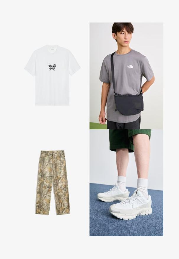 T-shirt bianco in cotone con maniche corte e collo tondo. Presenta una grafica centrale di una farfalla con motivo a fiamme nere. Texture liscia.; Pantaloni mimetici con un motivo a foglie verde e marrone multicolore, dotati di una classica cinque tasche e una vestibilità ampia.; Scarpe da ginnastica bianche con sovrapposizioni testurizzate, suola spessa e accenti grigi. Indossate con calze corte bianche e pantaloni corti verdi su una superficie blu.; Borsa a tracolla nera in nylon con tracolla regolabile, dotata di chiusura a cordoncino e dettaglio logo in rilievo. Indossata sopra una maglietta grigia.