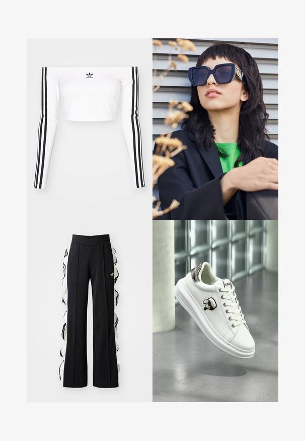 Crop top alb cu maneci lungi și umeri descoperiți dintr-un material elastic. Prezintă accente negre cu trei dungi pe maneci și un mic logo negru pe piept.; Pantaloni sport negri cu un brâu texturat, având panouri laterale albe și detalii volantate, și un logo brodat în partea din față.; Tenisii albi Karl Lagerfeld, cu șireturi, patch cu logo negru și bej, și tab clasic argintiu, plutind deasupra unei podele gri.; Ochelari de soare supra-dimensionați, de culoare neagră, cu un cadru gros și accente aurii, purtați cu un sacou negru și o cămașă verde aprins, pe un fundal orizontal.