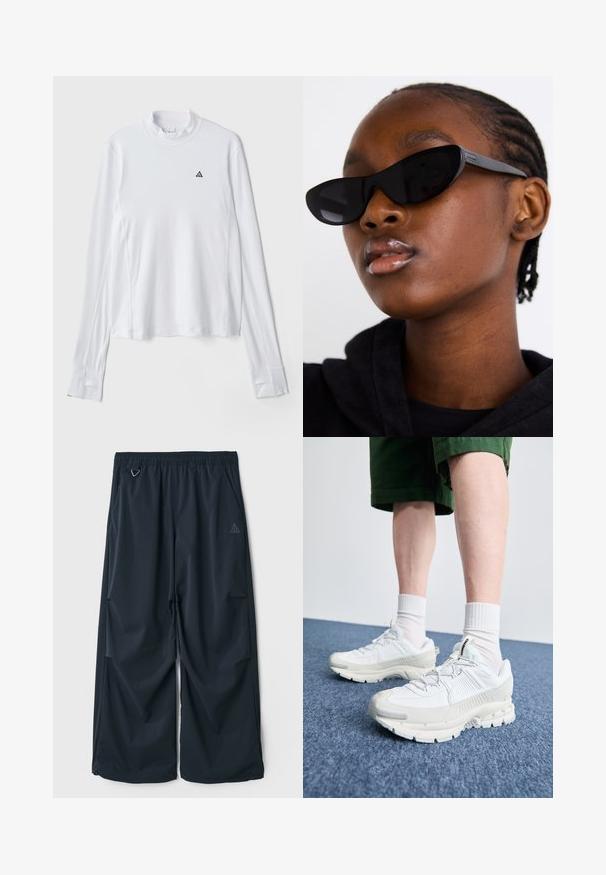 Witte langevleese shirt met een hoge halslijn, voorzien van een klein zwart driehoekig logo op de borst en een gestructureerde stof.; Donkerblauwe, wijde broek met een elastische tailleband, voorzien van twee zijzakken en een klein driehoekig logo aan de linkerkant. Gladde textuur.; Witte sportieve schoenen met textuuroverlays, een dikke zool en grijze accenten. Draag ze met witte crew-sokken en groene shorts op een blauwe ondergrond.; Zwarte cat-eye zonnebril met een matte afwerking, met een stijlvolle vorm en licht gebogen randen, geplaatst tegen de donkere kleding van een model.