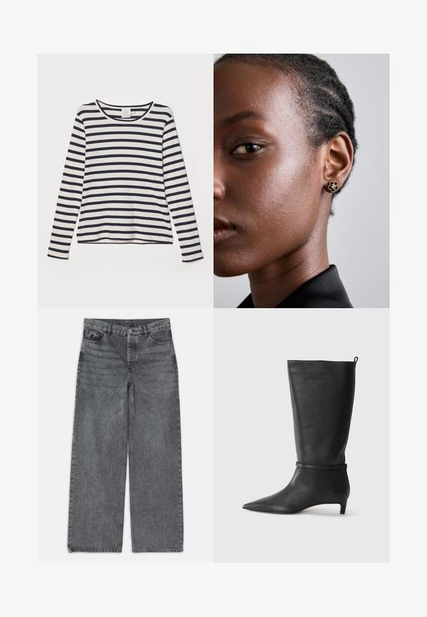 Langarmshirt in crème met marineblauwe horizontale strepen, voorzien van een ronde hals, ribbelstructuur en een ontspannen pasvorm.; Wijdere jeans in donkergrijs denim. Kenmerken zijn een hoge taille, vijf zakken en een sluiting met een knoop aan de voorkant. Glad textuur met subtiele vervaging.; Zwarte leren kniehoog laars met een spitse neus, accentueert door een ronde band rond de enkel en een lage, taps toelopende hak. Glad textuur.; Gouden bloemenstud oorbel met een gestructureerd zwart midden en verfijnde details. De heldere huid en het gevlochten haar van het model zijn zichtbaar in profiel.