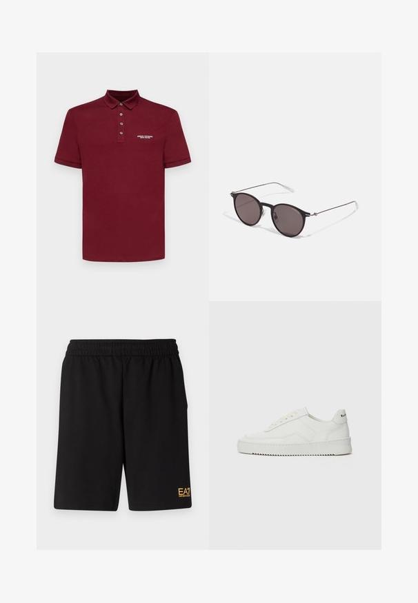 Armani Exchange Pólóing - cabernet; Fekete sportnadrág puha anyagból, rugalmas derékkal és egy kis sárga EA7 logóval a bal alsó lábszáron.; Fehér bőr sportcipő sima felülettel, kerek orral, lapos fűzőkkel és texturált talppal. Finom logó található a sarokon.; Fekete kerek napszemüveg sötét lencsékkel és karcsú fém szárakkal. Átlátszó szárvégeket és ezüst részleteket tartalmaz az ívnél. Minimalista dizájn.