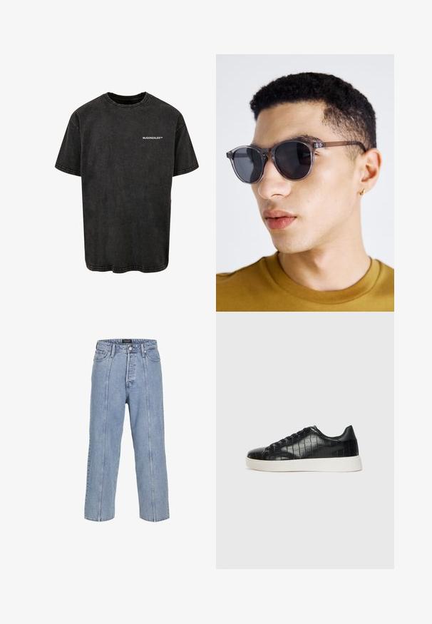 Czarny bawełniany t-shirt z okrągłym dekoltem, krótkimi rękawami i vintage'owym wyglądem, z białym nadrukiem logo z przodu.; Jasnoniebieskie dżinsy o luźnym kroju, szerokich nogawkach i widocznych detalach szwów. Posiadają zapięcie na guzik i zamek błyskawiczny oraz pięć kieszeni.; Czarne sneakersy z teksturowaną cholewką ze skóry z tłoczeniem w kształcie krokodyla, okrągłym noskiem oraz kontrastującą białą gumową podeszwą o gładkim wykończeniu.; Szare okrągłe okulary przeciwsłoneczne z przezroczystą oprawką, z ciemnymi soczewkami i cienkimi, eleganckimi zausznikami. Noszone przez osobę z krótkimi, kręconymi włosami.