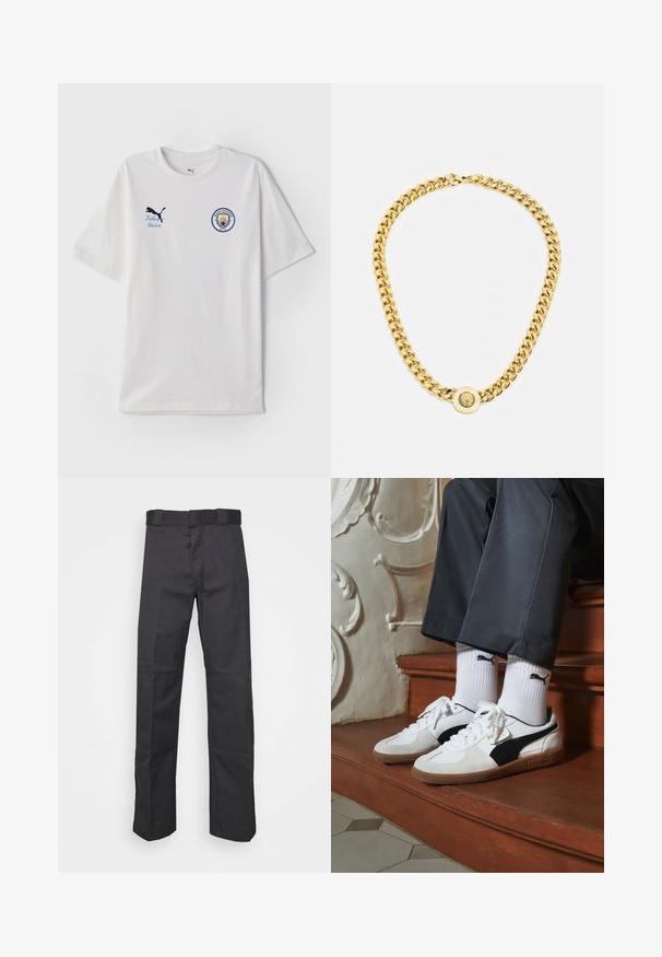 Bela bombažna majica s kratkimi rokavi, okroglo ovratnikom, modrim in rdečim logotipom Manchester City ter modrim logotipom Puma.; Črne hlače iz trpežnega blaga, z ravnim krojem, pasom z zankami za pas in šivi za dodano teksturo.; Puma superge v beli in črni usnjeni izvedbi, sročene s rjavim gumijastim podplatom. Usklajene z belimi nogavicami z črnim logotipom, nosijo se s temnimi hlačami.; Zlata verižica z velikimi medsebojnimi povezavami, ki ima v središču krožni obesek z izbočenim grbom.