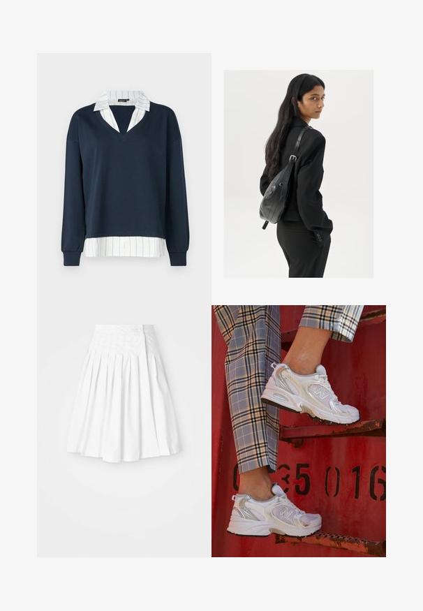 ONLY ONLFEEL V NECK - Ikdienas džemperis - navy; Baltajā krūtainajā svārkā ar pieguļošu jostu, sānos ir pogu aizdare, un tam ir gluda, aska tekstūra.; Baltas režģa sporta apavi ar sudraba akcentiem un teksturētu zoli, novietoti uz sarkanas virsmas, kombinēti ar kostīmpantaloniem ar kvadrātiem.; Sieviete ar garām tumšām matiem, ģērbusies melnā uzvalkā, nēsā melnu ādas plecu somu un skatās pāri plecam uz balta fona.