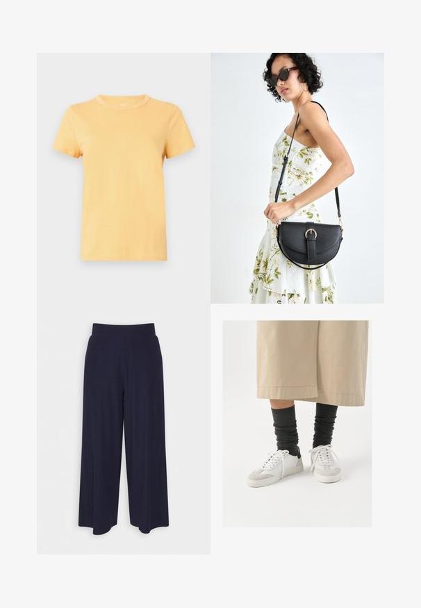 Īsām piedurknēm, apaļo kaklu t-krekls, kas izgatavots no mīksta, viegla kokvilnas, gaiši dzeltenā krāsā ar gludu tekstūru un tīru apdari.; Platas kājas bikses tumši zilā audumā ar svītrainu tekstūru. Aprīkotas ar gludu jostasvietu un plūstošu siluetu, sasniedzot vidus teļus.; Baltas un pelēks sneakers ar melnu papēža akcentu, ar gludu ādas virsu un teksturētu zamšu purngali. Nēsāti ar tumši pelēkām, vaļīgām zeķēm.; Melnas ādas rokassoma ar izliekta formu, noņemamu siksnu un zelta aksesuāriem. Somai ir vāciņš ar sprādzes detaļu.