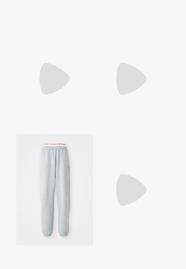 Beige cropped t-shirt made of ribbed fabric, featuring a round neckline and short sleeves. Includes a small contrasting logo on the front.; Gray sweatpants with elastic waistband featuring a red and white Nike logo. Cuffs at the ankles, soft fabric, and a relaxed fit.; White platform sneakers featuring a smooth leather-like upper, rounded shape, padded collar, and textured rubber sole with defined treads.; Beige handbag made of soft material, featuring a slouchy design, stitched detailing, and two shoulder straps. Suitable for everyday use.