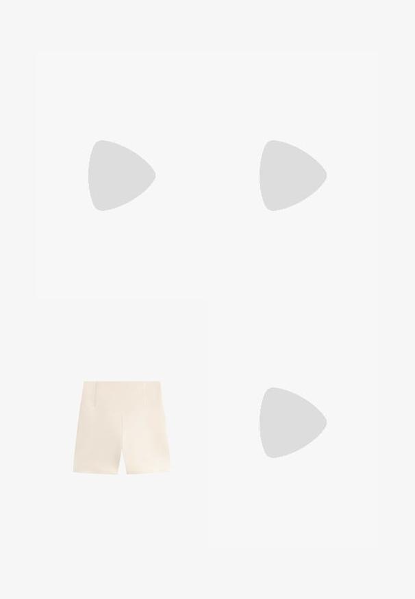 Svijetlosmeđi dugi rukavi crop top s dizajnom uvijenog prednjeg dijela, izrađen od glatkog materijala. Ima okrugli izrez i prilagodljive rukave.; Bež šorts s visokim, strukturiranim strukom. Izrađen od glatkog, laganog materijala. Ima čisti dizajn bez uzoraka ili ukrasa.; Bijele visoke tenisice s debelim, teksturiranim potplatom, koje imaju glatki gornji dio, okrugli vrh i tonirane vezice, postavljene na žutu pozadinu.; Smeđi, podstavljeni ruksak s zakrivljenim oblikom, koji ima zatvaranje na patentni zatvarač i podesivu naramenicu za svestrane opcije nošenja.