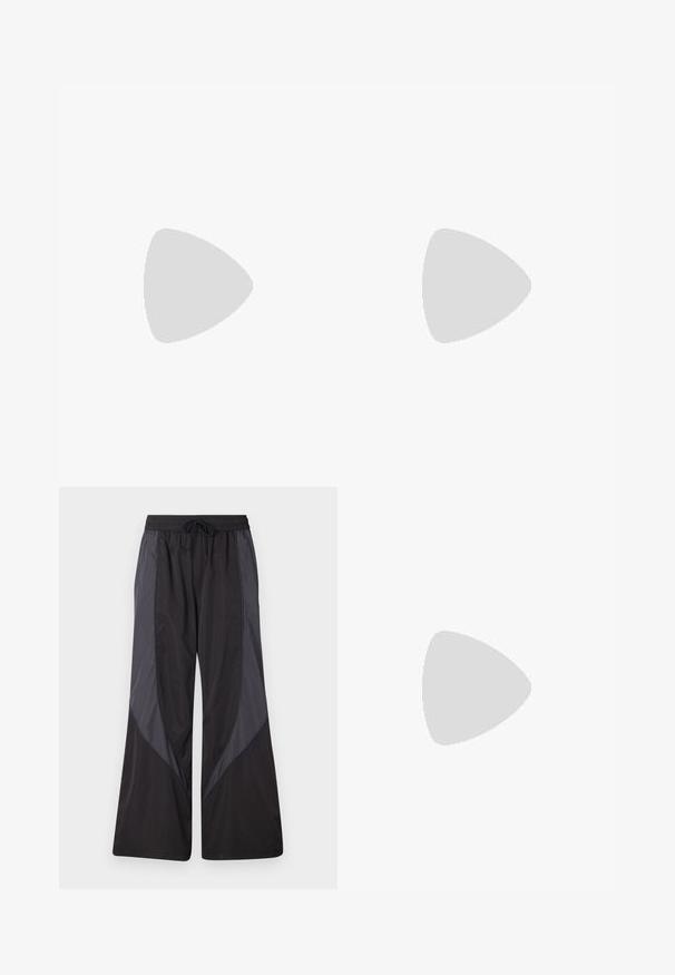Feng Chen Wang DECONSTRUCTION UNISEX - Tops ar garām piedurknēm - white; Han Kjøbenhavn PANELLED TRACK TROUSERS - Treniņtērpa apakšdaļas - anthracite black; Baltās zemas tenisa kedas ar zaļām malām, beigu zamšādas detaļām un krēmkrāsas zoli ar rievotu apakšu.; Melna soma ar taisnstūra formu, izgatavota no gludas materiāla. Aprīkota ar augšējo rāvējslēdzēju, regulējamu siksnu un baltu tekstu: "HAN KJØBENHAVN."