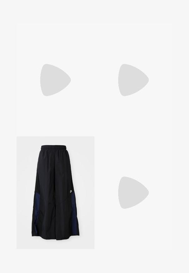 Blue athletic jersey made of synthetic fabric, featuring a geometric and animal print pattern, with green accents and a logo detail.; Black wide-leg pants made of lightweight fabric, featuring a navy blue side panel and an elastic waistband. Small white logo on bottom.; Nike sneakers featuring a white upper with black accents, textured overlays, and a sleek design. Black laces and visible branding complete the look.; Silver hoop earrings with a textured, organic design. Each earring features a smooth, rounded shape and a polished finish.