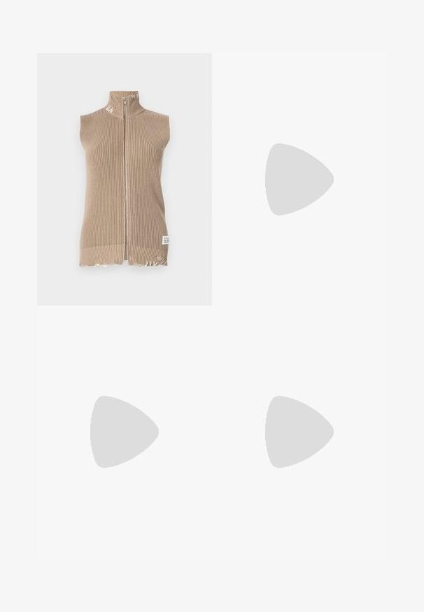 Beige knitted sleeveless vest with a high collar, full zip, frayed hem, and a label at the bottom right. Textured ribbed fabric.; White button-up shirt with a pointed collar, long sleeves, and a small blue logo on the left chest. Crafted from cotton fabric.; Black high-waisted jeans made from denim, featuring a straight leg design, front pockets, a zip fly, and a metal button closure.; Black suede sneaker with white accents and laces, featuring a thick white sole and contrasting stitching, paired with a white sock.