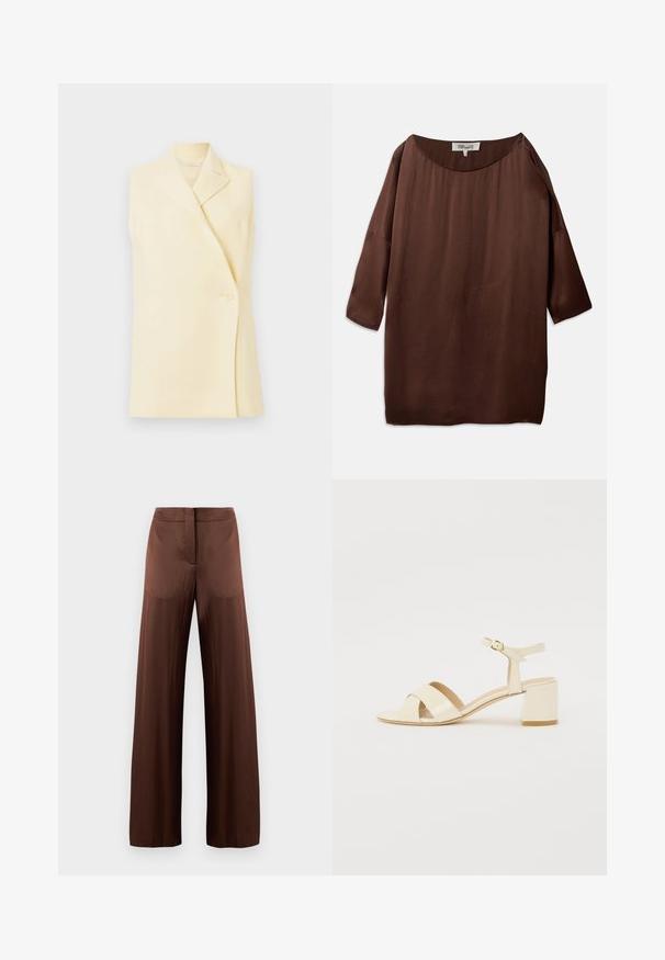 Žuta bezrukava blazerica s reverima, zatvaranjem na jedan gumb i krojem koji prianja uz tijelo. Mekani materijal s glatkom teksturom.; Smeđa, široka bluzica s velikim izrezom i rukavima do tri četvrtine, izrađena od glatkog, teksturiranog materijala. Gornji dio ima suptilne bore.; Smeđe hlače širokih nogavica izrađene od glatkog, laganog materijala, s ravnim prednjim dijelom, bez džepova i ravnim siluetom.; Bež sandale od lakirane kože na visokoj peti s dizajnom preklopnog remena, otvorenim prstima, podesivim remenom oko gležnja i blok petom. Glatka tekstura.