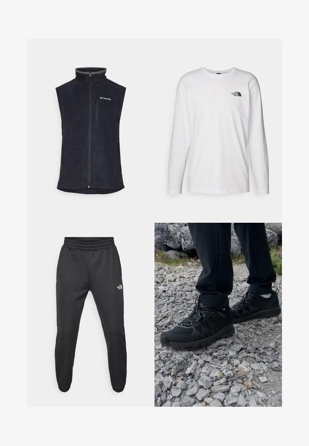 Navy fleece vest with a high collar, front zipper, and two side pockets. Features a gray accent on the collar and left chest logo.; White long-sleeve T-shirt made of cotton with a crew neck. Features a small black logo on the chest. Smooth texture, regular fit.; Black sweatpants with a drawstring waist, tapered fit, elastic cuffs, and a small white logo on the left thigh, made from smooth fabric.; Black outdoor shoes with mesh and synthetic material, featuring a textured upper, secured lacing system, and a rugged outsole, on rocky terrain.