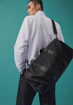Bolsas, mochilas y maletas de hombre | Comprar en Zalando