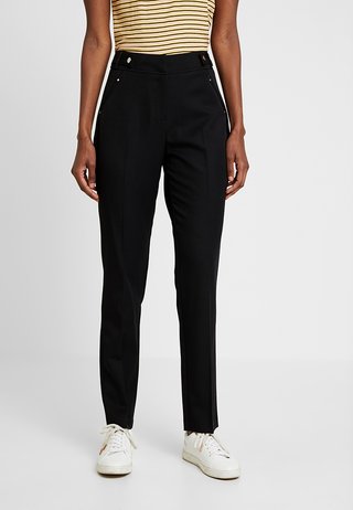 TAPERED - Trousers - black