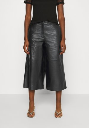 Skinnbukser på nett | Zalando.no Oakwood MEGHAN - Skinnbukser - dark green