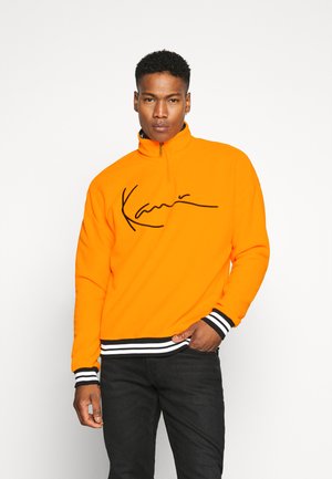 Oransje Parkdress til jente og gutt Karl Kani på nett hos Kjøp Karl Kani Skjorter til herre på nett | FASHIOLA.no