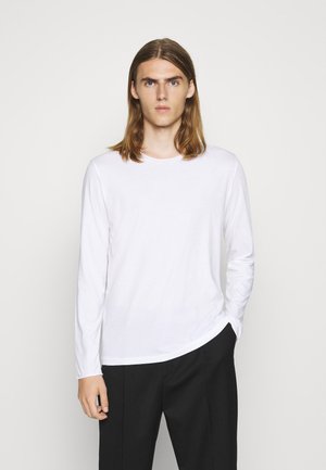 Hvite Filippa K Black Friday spesialtilbud – Zalando.no Filippa K M. Lycra Polo T-Shirt - Poloskjorter WHITE - Herreklær Spesialtilbud