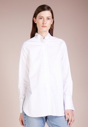 Skjorter til dame, herre og barn By Malene Birger på nett By Malene Birger EAUBONNE Skjorte chambray blue Zalando.no