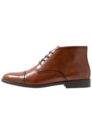 Brune Dressko Call it Spring til herre på nett | Zalando.no Call it Spring ERORENNA Pensko med snøring cognac